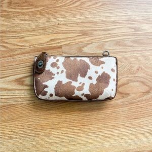 joy Susan Cow print Clutch